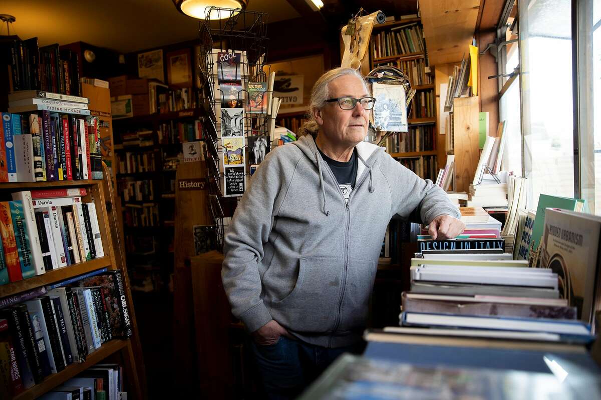 A portrait of Eric Whittington at Bird & Beckett Books & Records, Tuesday, March 17, 2020, in San Francisco, Calif. Whittington is the owner of the store, located at 653 Chenery St.