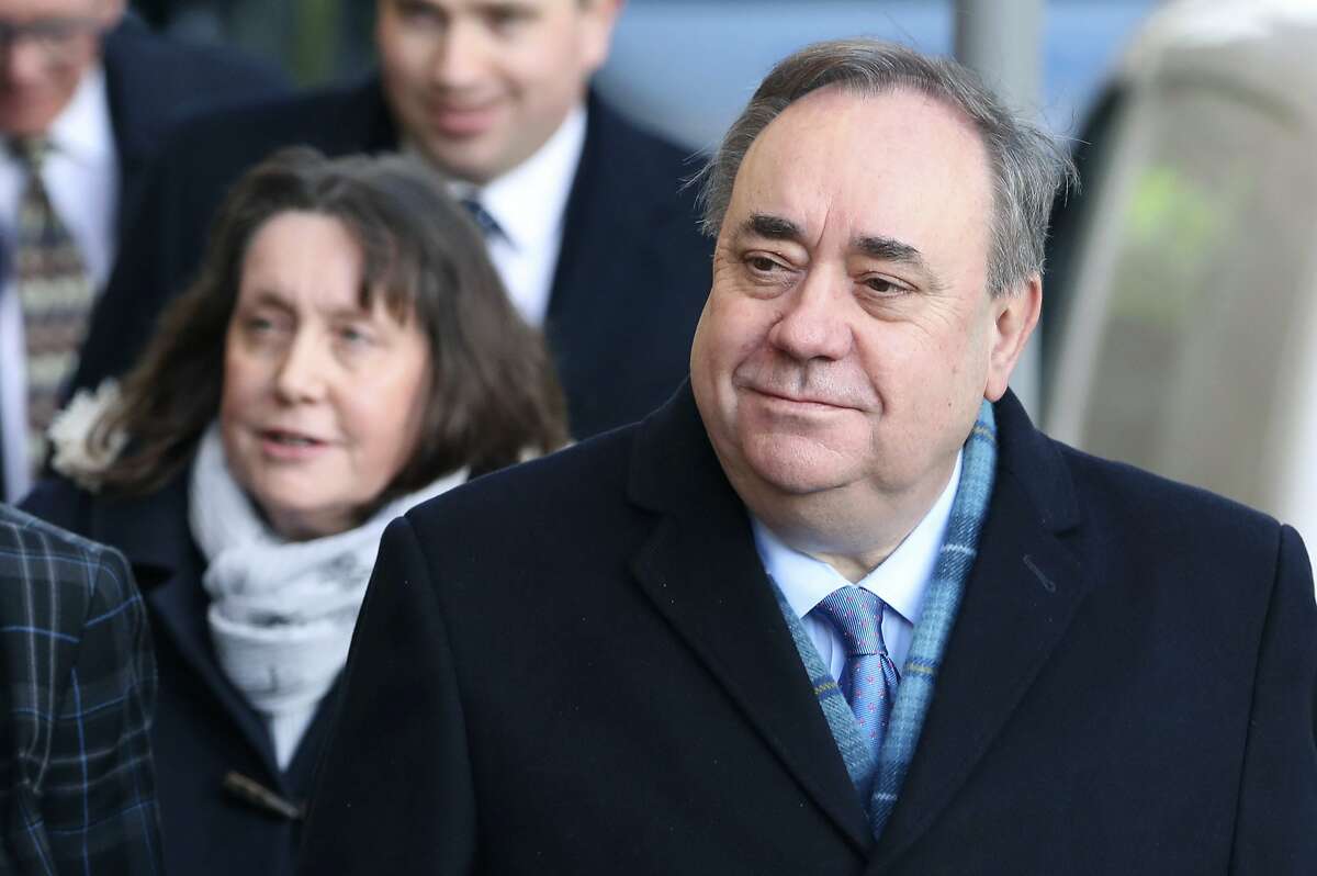 Former Scottish first minister Alex Salmond arrives at the High Court for the first day of his trial, in Edinburgh, Scotland, Monday, March 9, 2020. Salmond, one of the country's best-known politicians is on trial for a total of 14 charges of attempted rape, sexual assault and indecent assault against 10 women. (Andrew Milligan/PA via AP)