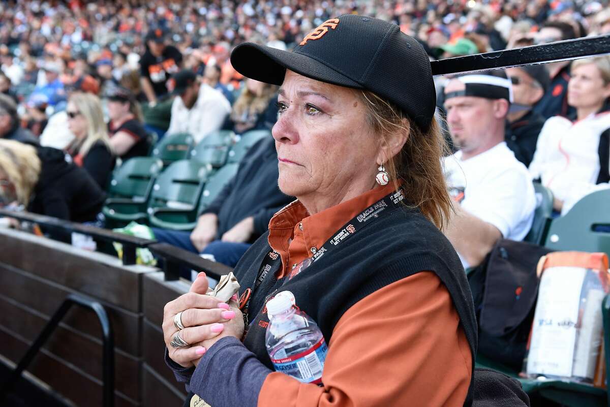 Giants employee Claudette Evdokimoff tears up during Giant’s managing coach Bruce Bochy final farewell speach at Oracle Park on September 29, 2019 in San Francisco, Calif.
