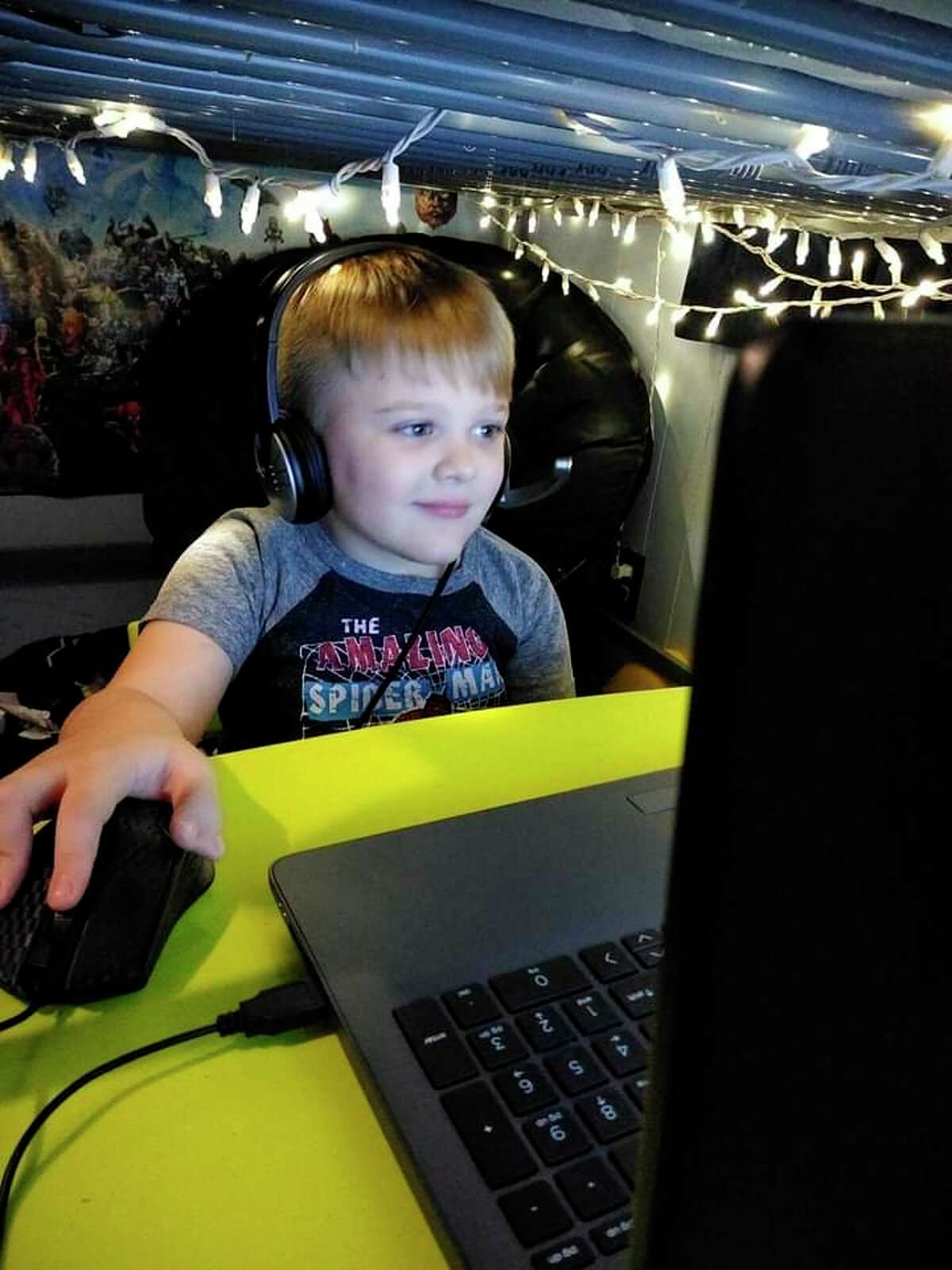 Bruce who is a kindergarten student at the Michigan Great Lakes Virtual Academy that is located in Manistee continues his learning despite the coronavirus. The online school has remained open, but has needed to make several changes to its teaching to accommodate students and teachers. (Courtesy photo)