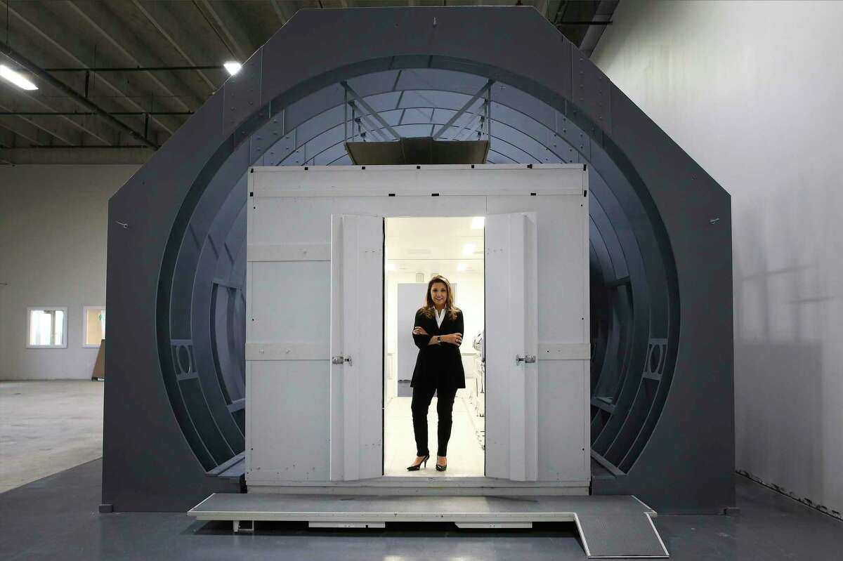 Knight Aerospace has started building flying hospital rooms to help governments respond to medical crises like COVID-19. CEO Bianca Rhodes - pictured standing inside a mockup of one their modules fitted inside the frame of an aircraft cargo bay - said their Universal Patient Modules are better designed and built to handle the rigors of flight and are customized to the needs of their clientele. Knight Aerospace, headquartered at Port San Antonio, recently moved into a larger facility to ramp up production of their modules. One of their modules - depending upon customization - takes about four to six months to complete and shipped to the buyer according to Rhodes.