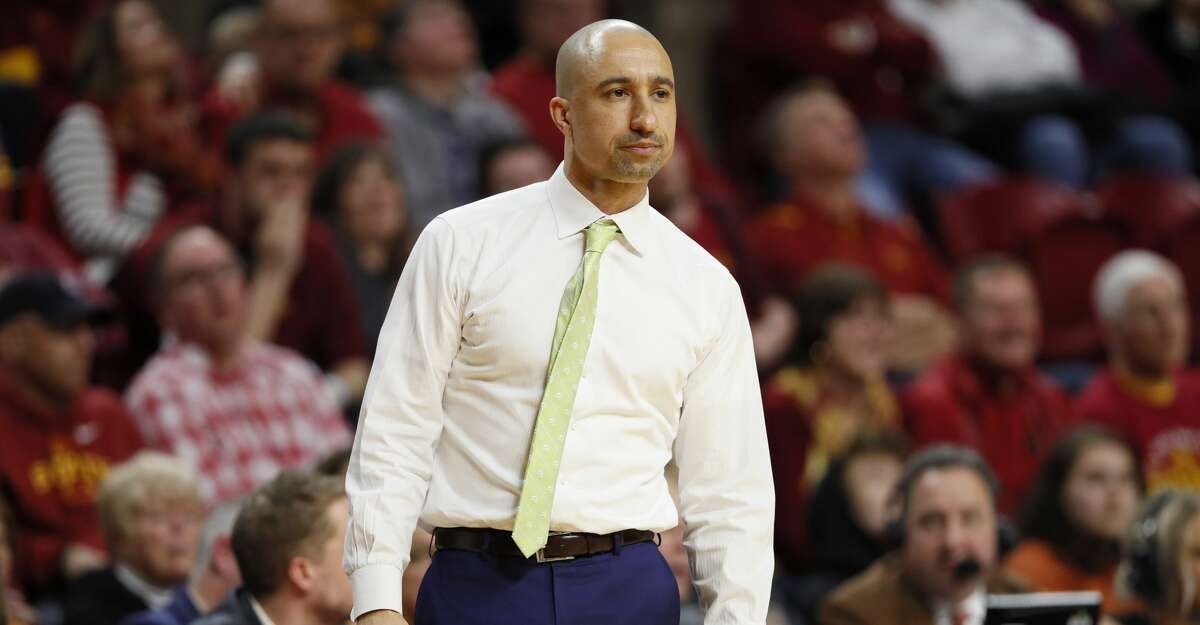 Texas head coach Shaka Smart watches from the bench during the second half of an NCAA college basketball game against Iowa State, Saturday, Feb. 15, 2020, in Ames, Iowa. Iowa State won 81-52. (AP Photo/Charlie Neibergall)