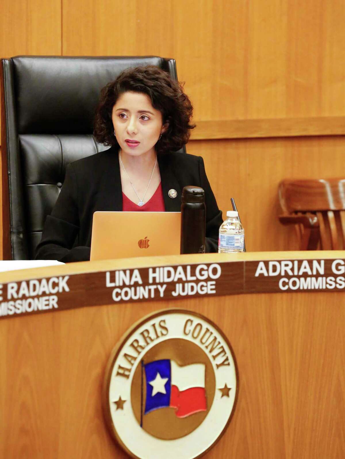 Harris County Judge Lina Hidalgo leads a emergency meeting due to the Coronavirus (COVID-19) outbreak Tuesday, March 17, 2020, in Houston. Only 10 people were allowed in the Harris County Commissioner Court.