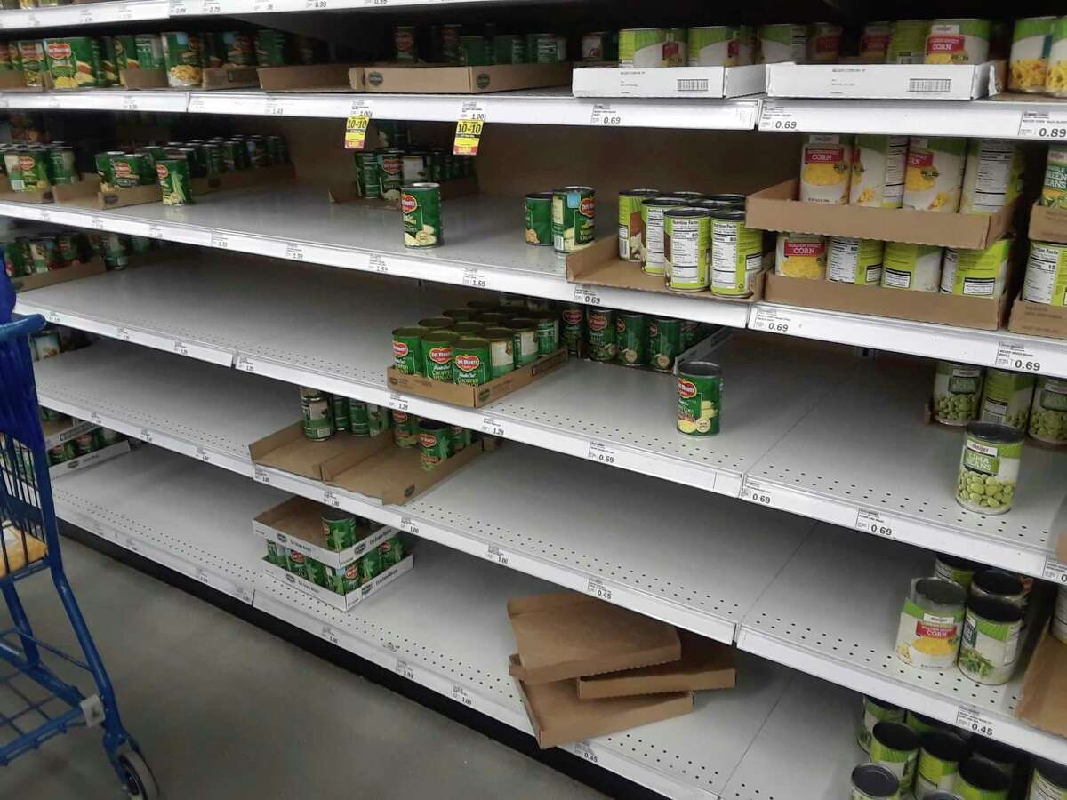 Canned goods are flying off the shelves at area retailers as staff clamor to keep facilities clean and disinfected. (Courtesy Photo)