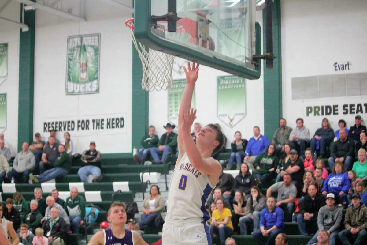 Evart's Donavin Reagan goes up for the basket against Shelby. (Herald Review photo/John Raffel)