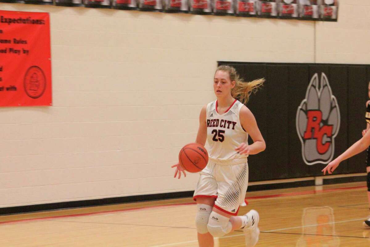 Reed City's Alison Duddles dribbles down the court in recent action. (Pioneer photo/John Raffel)