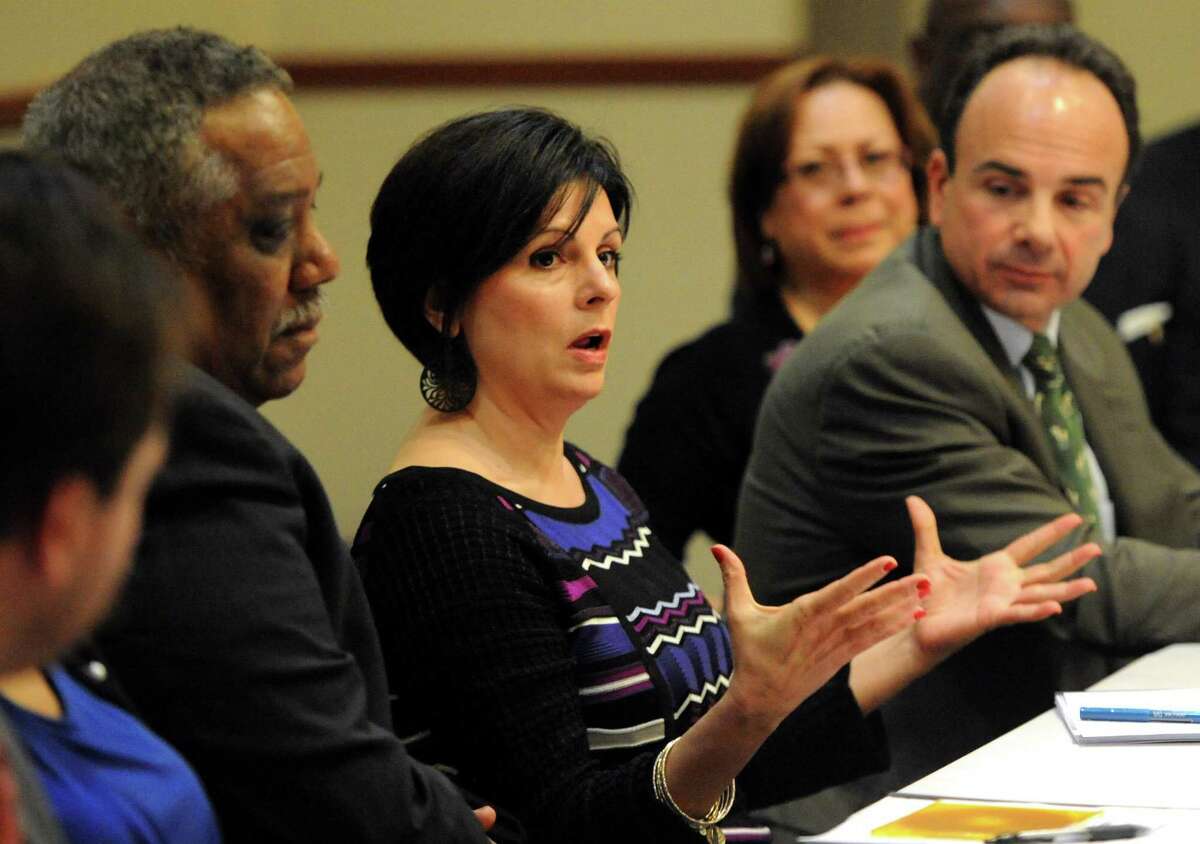 Rina Bakalar makes a point during a meeting with Mayor Joe Ganim and the Transition Task Force for the city of Bridgeport. Bakalar and the town's Economic Development Commission are working on creating a list of available business services for local merchants.