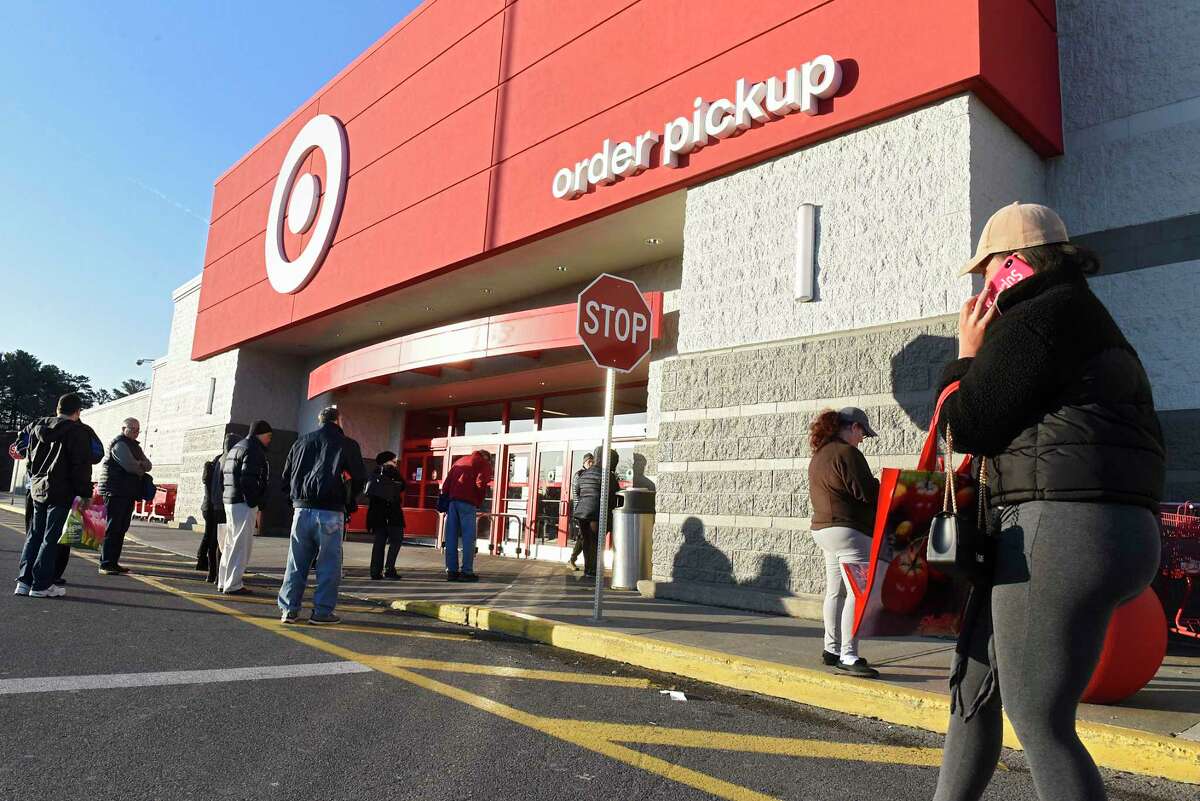 Customers wait outside of Target before they open for the day on Wednesday, March 18, 2020 in Colonie, N.Y. (Lori Van Buren/Times Union)