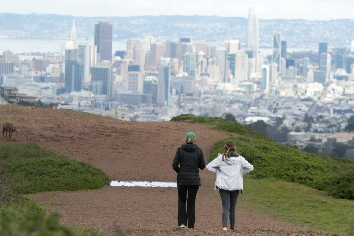 Can I go on a socially distant walk with a friend? “Outdoors is safer than indoors for sure because of the open air and circulation,” Noble said. “The key is keeping a face mask on. Then if we try to stay three or four feet apart at a minimum we’re still able to have eye contact and social connection."