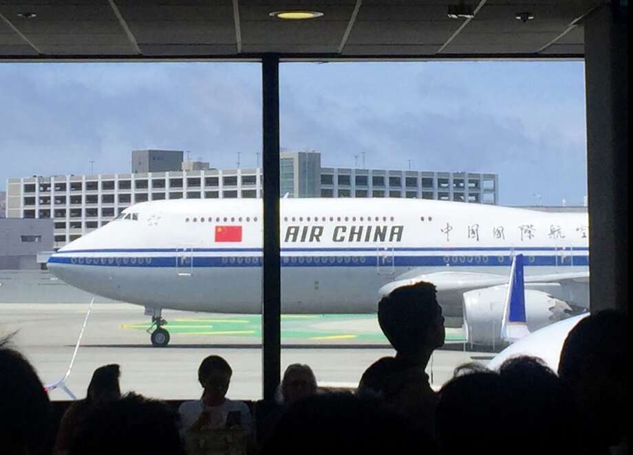 An Air China 747 lumbers through SFO. The Chinese national carrier's flights between the US and China are on hold as tensions rise between the US and China Photo: Chris McGinnis