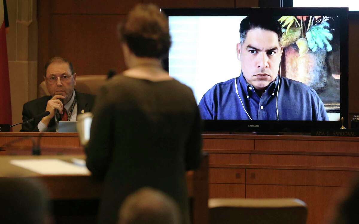 District 8 Councilman Manny Peláez is shown on a video monitor during Thursday’s council meeting. Peláez and District 3’s Rebecca J. Viagran were present via video-conferencing since both are self-quarantining from their homes.