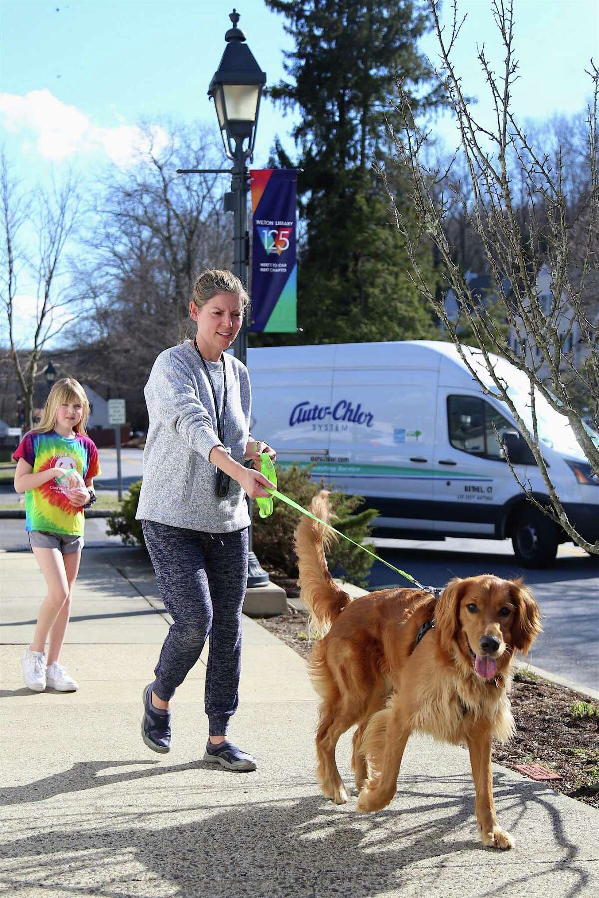 Juliet Craig of Wilton takes a short walk around the village with her daughter Natalie, 11, and their dog Chewie.