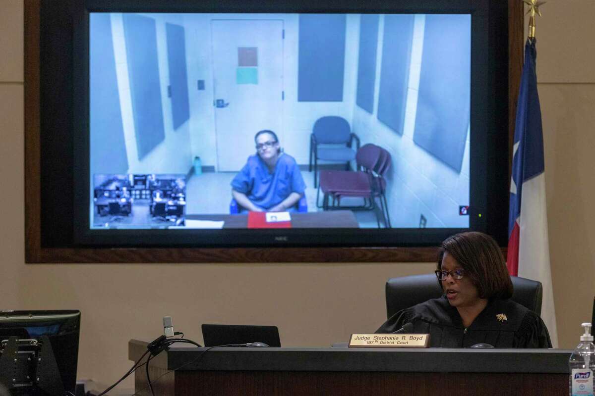 Judge Stephanie Boyd presides over a case Thursday, March 19, 2020, where the defendant appeared via videoconference. The state district courts are trying videoconferencing as a means to keep down the number of people who have to be in the courtroom as the coronavirus outbreak causes concern.