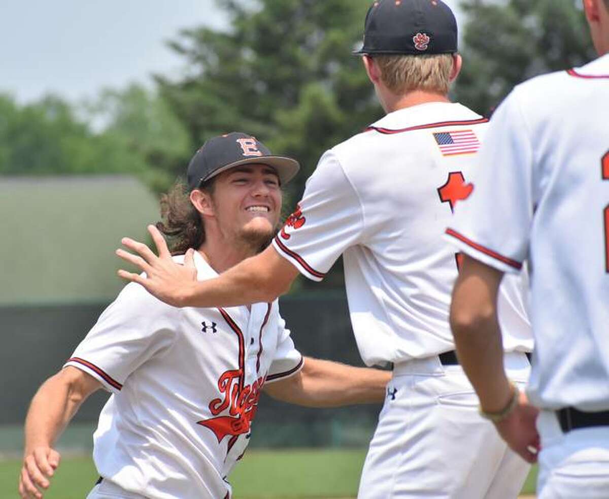 Edwardsville pitcher Collin Salter celebrates after closing out the win in the sectional championship game.