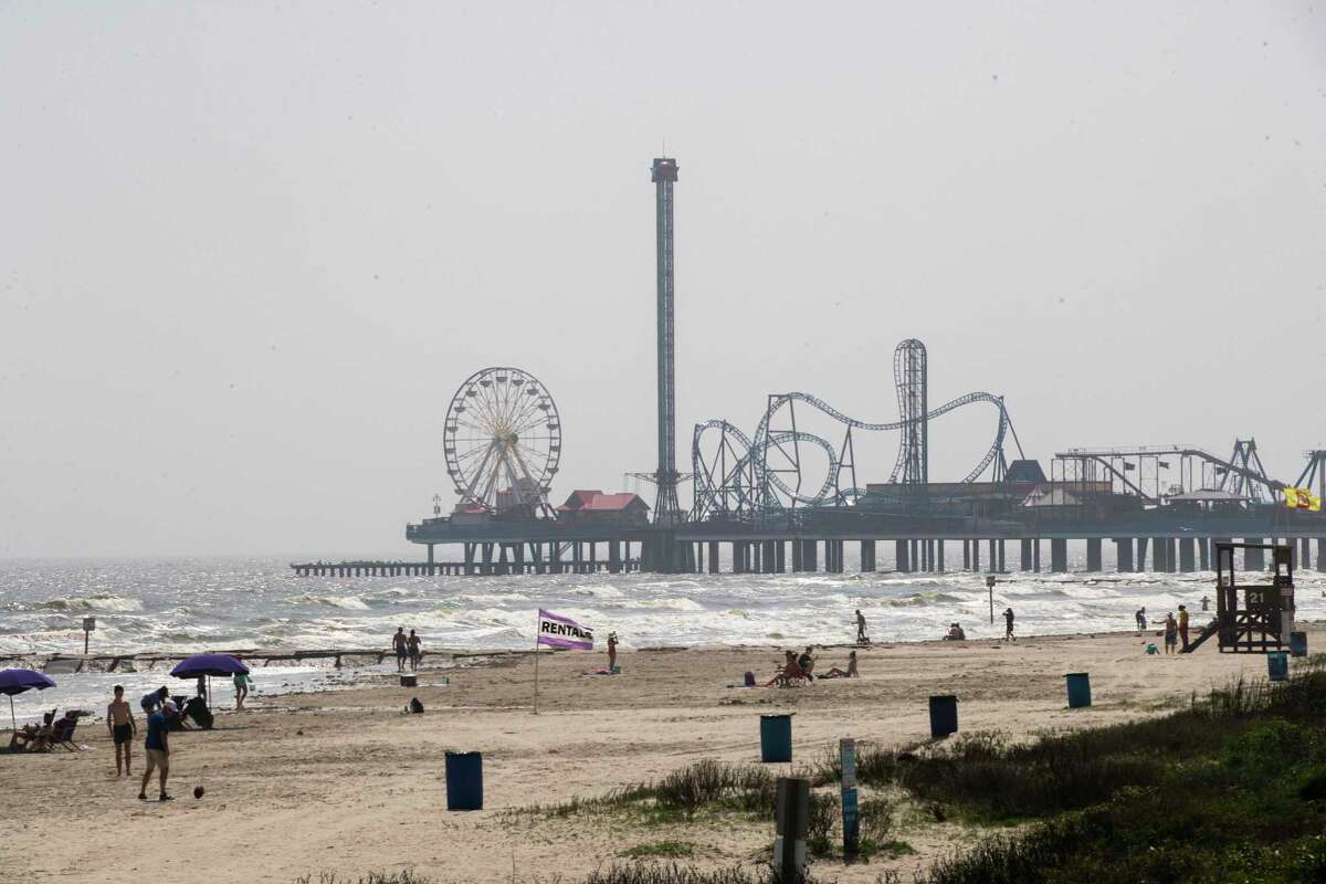 Pleasure Pier in the distance in Galveston on Thursday, March 19, 2020.