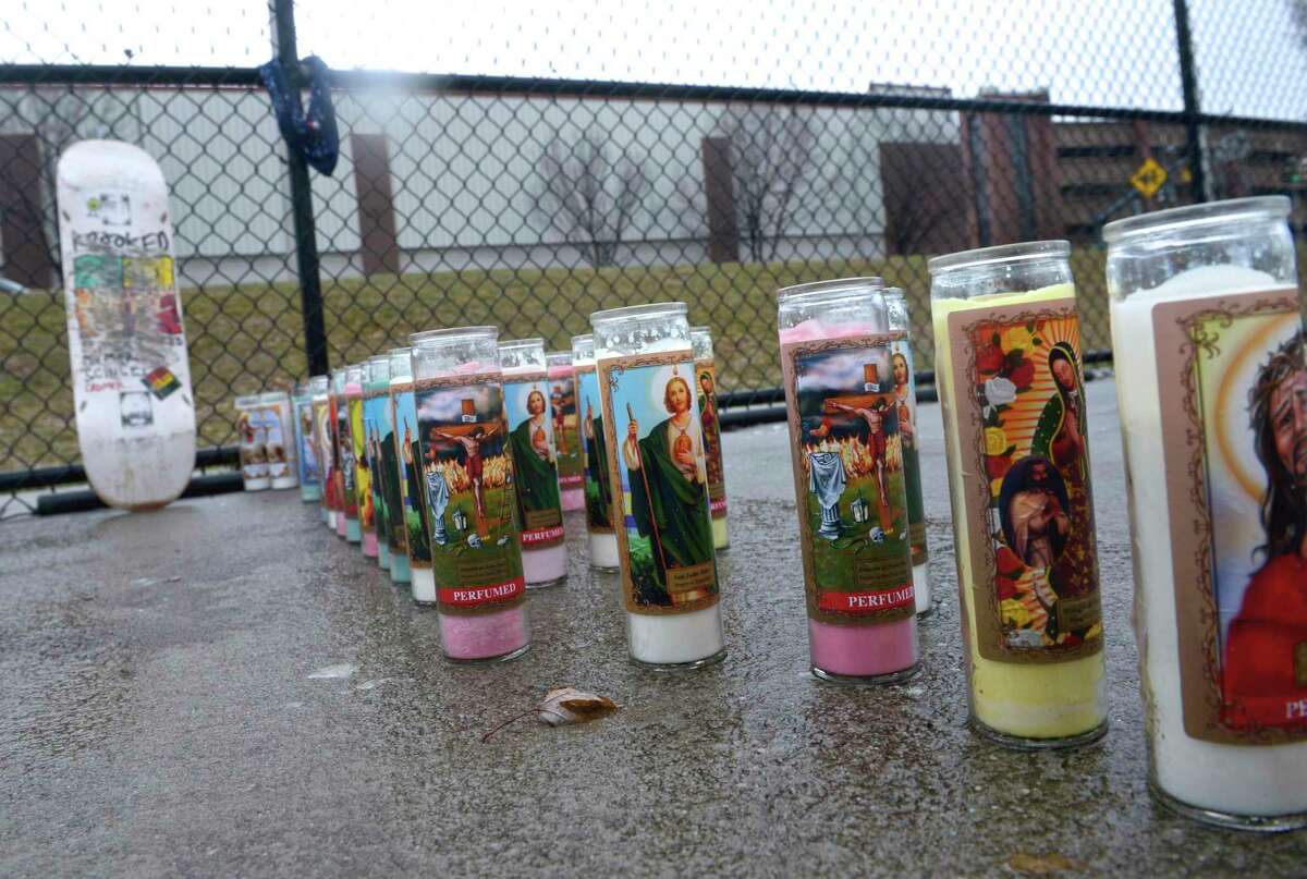 Candles spell out the first name of Wednesday’s fatal stabbing victim, Willy Placencia, at the Danbury City Center Skate Park. Friday afternoon, March 20, 2020, in Danbury, Conn.
