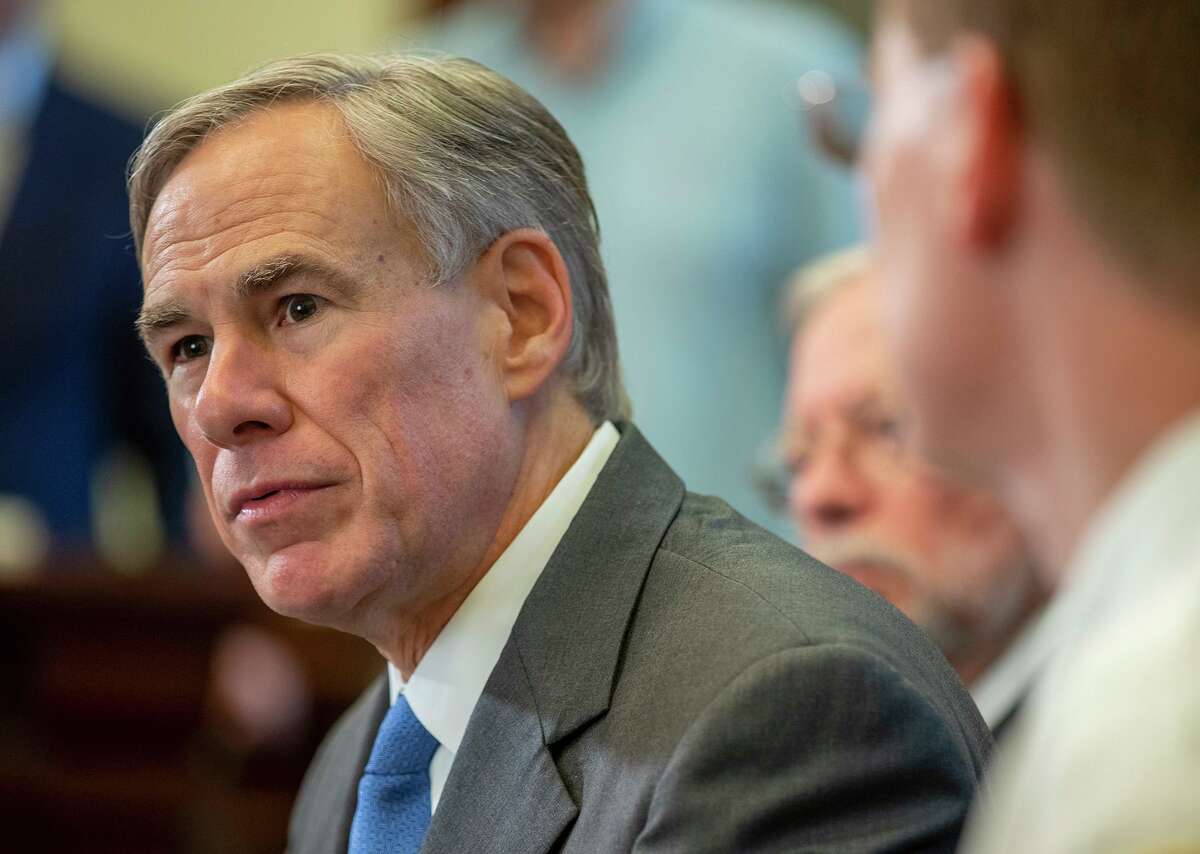 Texas Gov. Greg Abbott and top officials announce new state policies to combat the coronavirus at the governor’s office press conference room on Thursday, March 19, 2020, in Austin, Texas. (Ricardo B. Brazziell/Austin American-Statesman via AP)