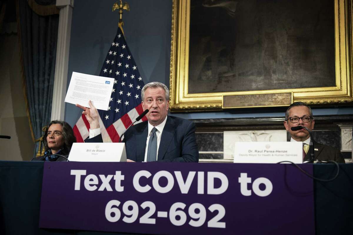 New York Mayor Bill de Blasio holds up an advisory from the Centers for Disease Control and Prevention during a recent news conference on COVID-19. Now is the time to lead the nation with an FDR fervor to combat the coronavirus. While de Blasio recently reached FDR’s rhetorical heights, President Donald Trump has been nowhere close.