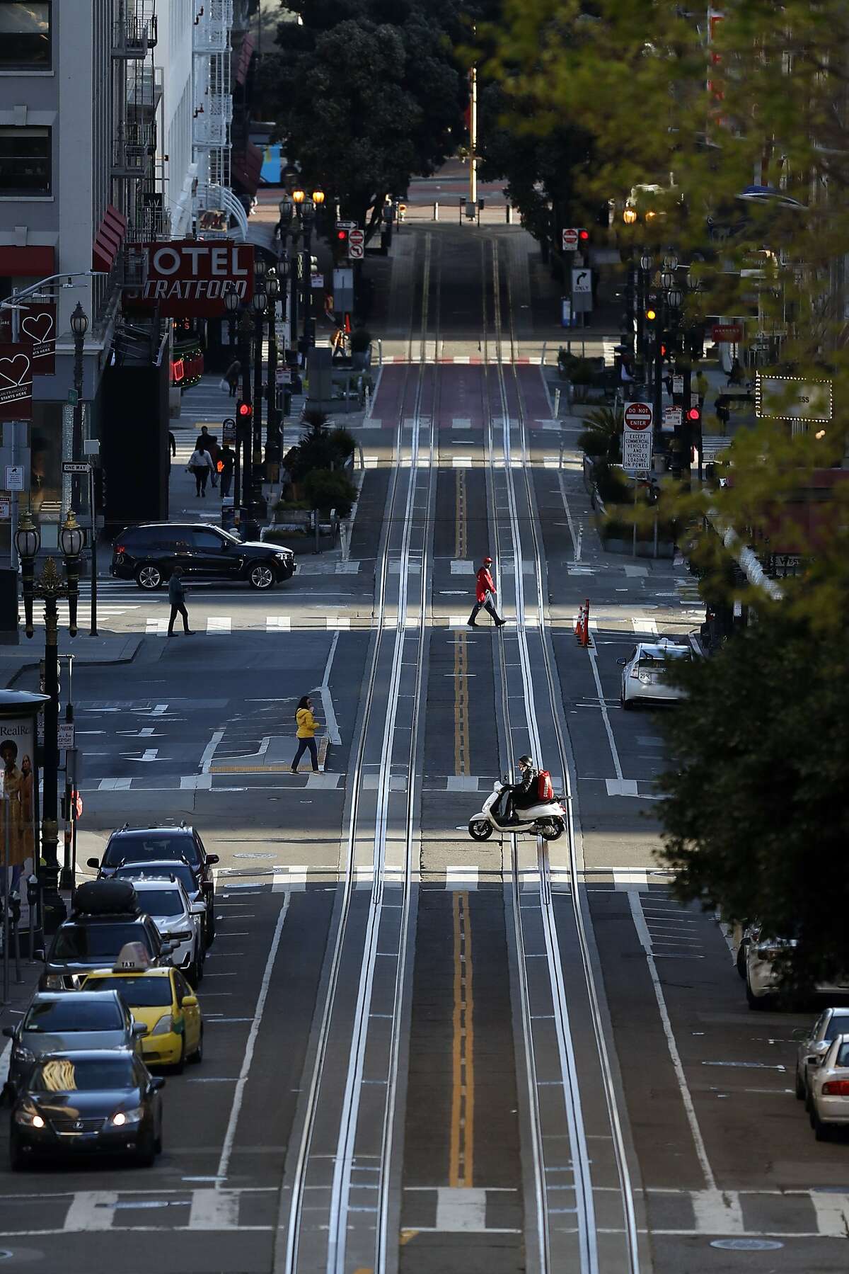 During what normally would be rush hour, vehicular traffic on Powell Street is nearly non-existent during coronavirus shelter in place in San Francisco, Calif., on Thursday, March 19, 2020.