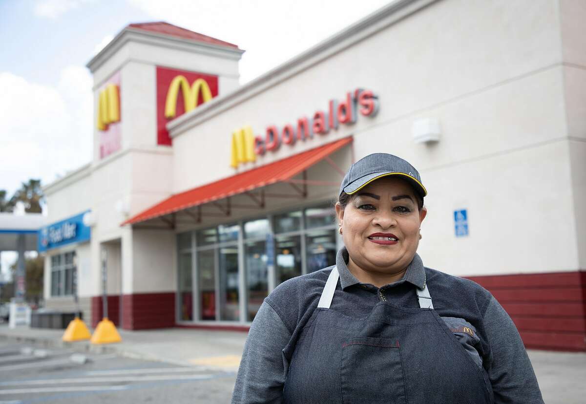 Ana Martinez poses for a portrait during a work break at McDonald's Friday, March 20, 2020, in Milpitas, Calif. She doesn’t get health insurance through McDonald’s. She has some insurance from her husband's job at Kellogg's cereal, but worries it is not enough and the out of pocket costs are high.