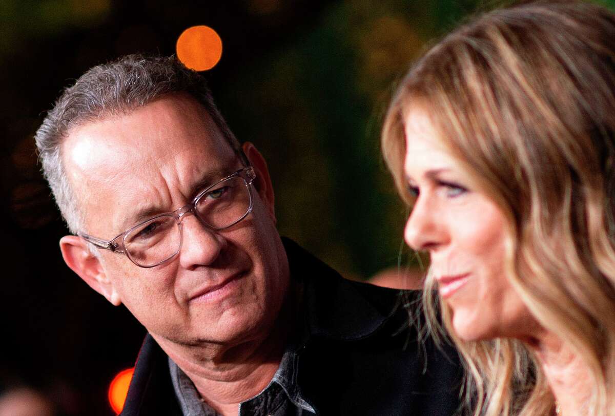 FILE - Actors Tom Hanks (left) and his wife actress/singer Rita Wilson attend "JONI 75: A Birthday Celebration" Live at the Dorothy Chandler Pavilion in Los Angeles on November 7, 2018. Tom Hanks and his wife Rita Wilson both tested positive for the coronavirus.