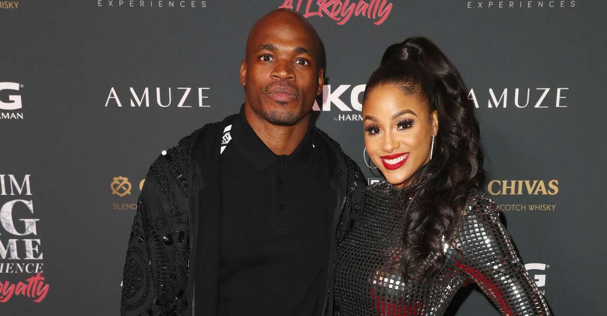 Adrian Peterson (L) and Ashley Brown Peterson attend The Maxim Big Game Experience at The Fairmont on February 02, 2019 in Atlanta, Georgia. (Photo by Joe Scarnici/Getty Images for Maxim)