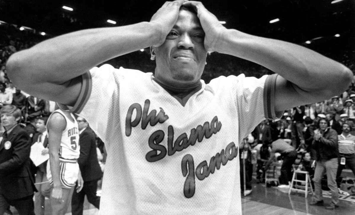FILE - In this April 4, 1983, file photo, Houston's Renaldo Thomas holds his head after losing 54-52 to North Carolina State in the championship game of the NCAA colle basketball championship game in Albuquerque, N.M. (Larry Reese/Houston Chronicle via AP, File)