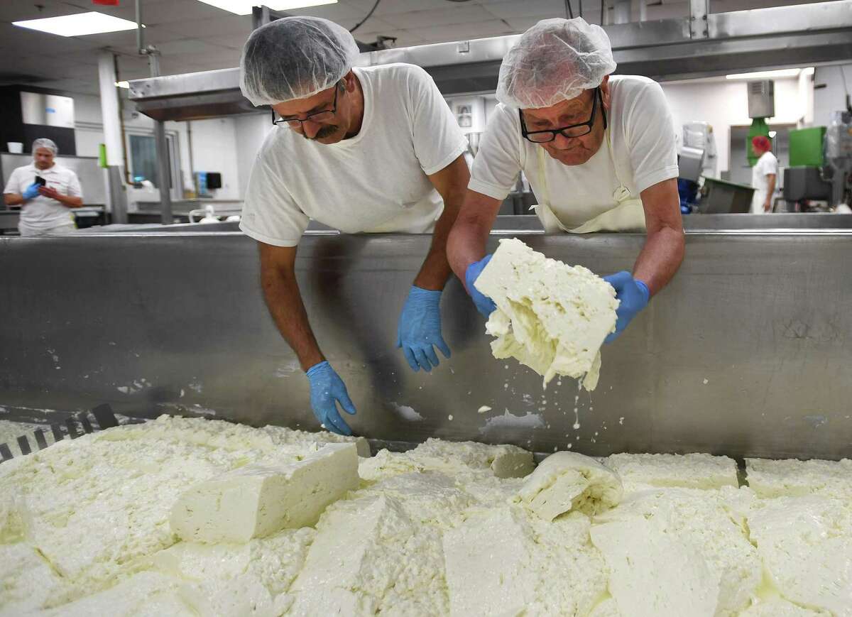 The Liuzzi Cheese factory in Hamden, Conn., in August 2019. Under an executive order that takes effect Monday, March 23, 2019, food producers are deemed essential under a list of such businesses that can remain open beyond March 23, 2019, as Connecticut works to slow the transmission of the novel coronavirus COVID-19.