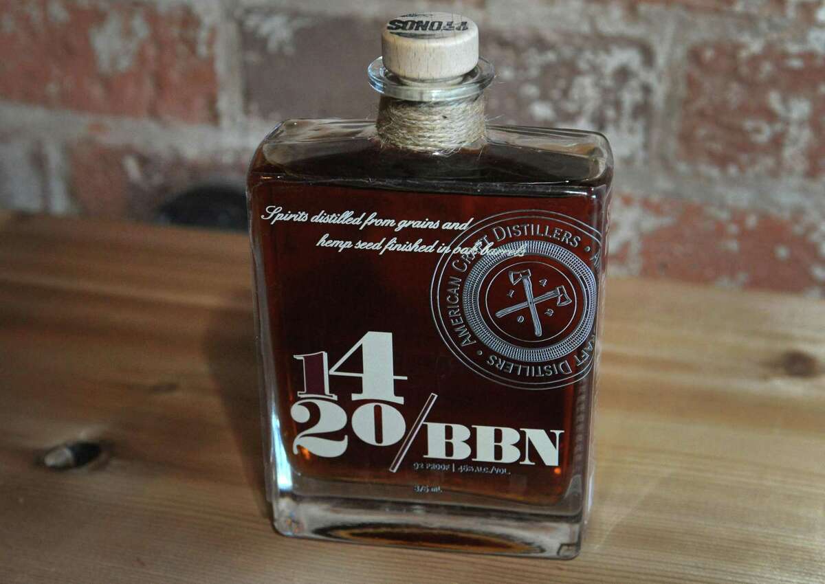A bottle of whiskey produced by SoNo 1420 American Craft Distillers, which like other distilleries nationally is converting its operations to the production of hand sanitizer from its ready inventory of ethanol.