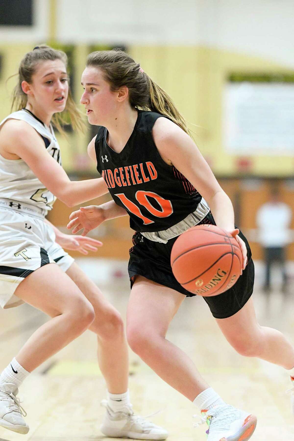 Ridgefield High's Kate Wagner (10) against Trumbull High on Jan. 10 at Trumbull High School.
