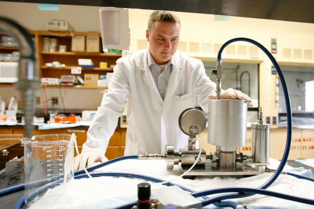 Dr. Brenton Scott, chief operating officer of Houston-based Pulmotect, works in the company’s lab.