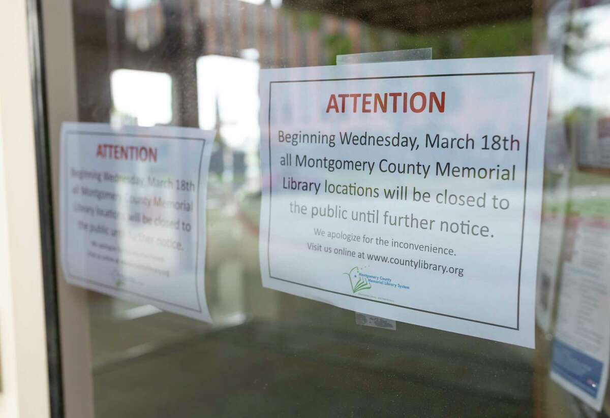 Temporary closure signs were placed at the Montgomery County Public Library in response to COVID-19 in Conroe, Wednesday, March 18, 2020. Due dates for book returns were extended and all library book drops are closed until further notice.