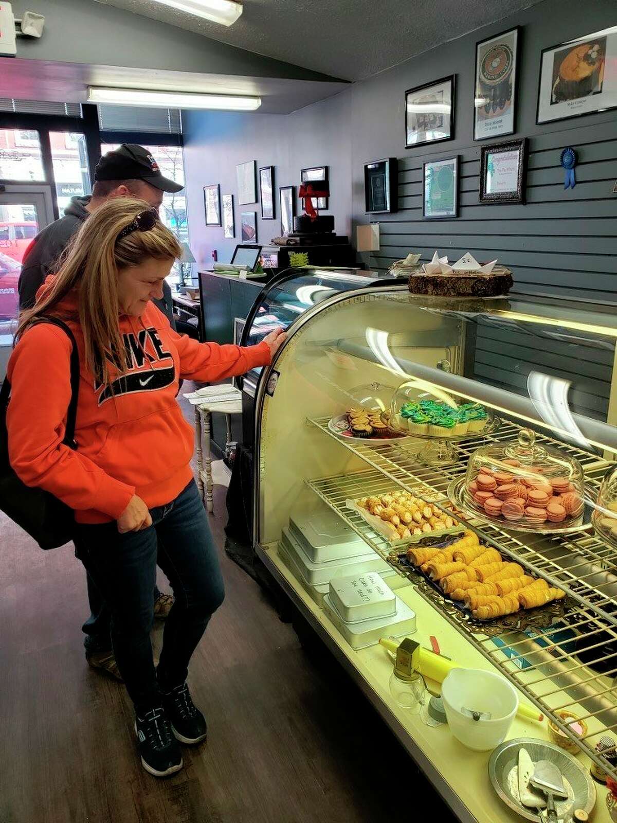 Customers Theresa Mercer and Thomas Hahn shop for goodies at the Pie wHole bakery in Big Rapids. (Pioneer photo/Nicole Chipman)