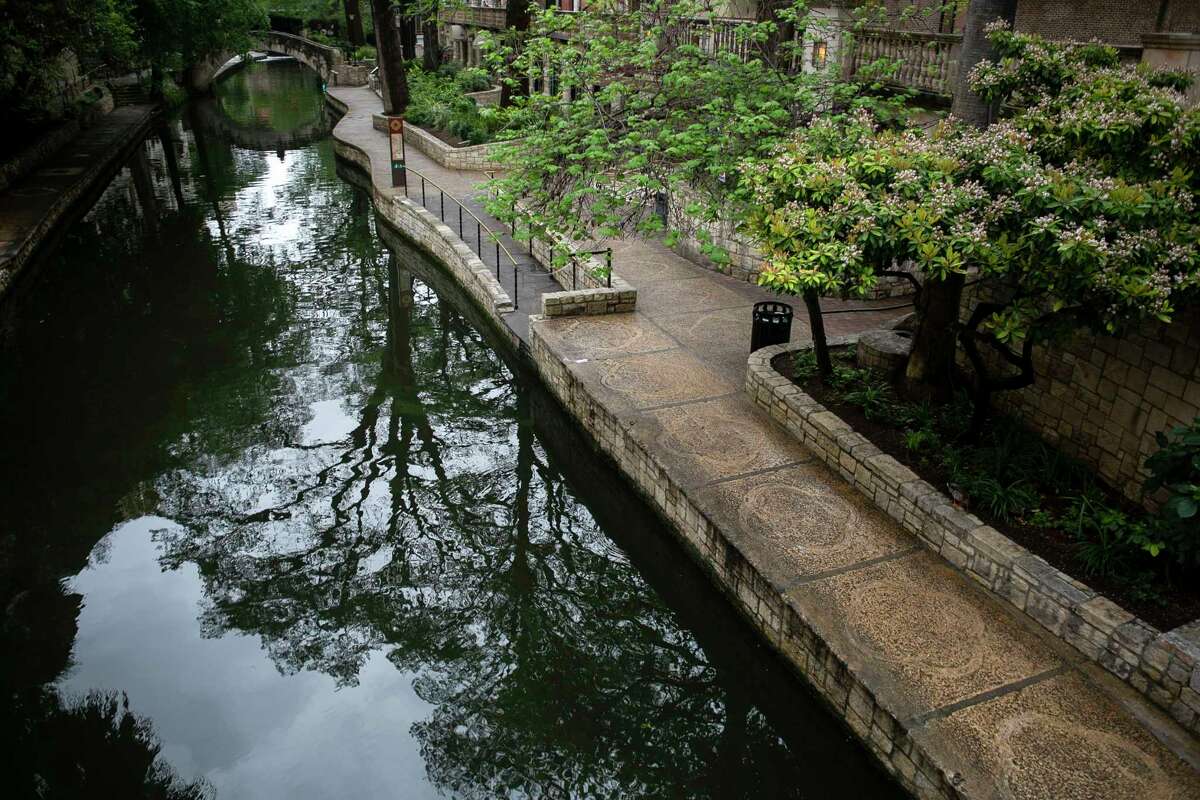 An empty Riverwalk as seen from the N. St. Mary's Street bridge in downtown San Antonio, Texas, on March 23, 2020. Monday afternoon Mayor Ron Nirenberg issued a "stay home" order to go into effect 11:59 p.m. Tuesday night.
