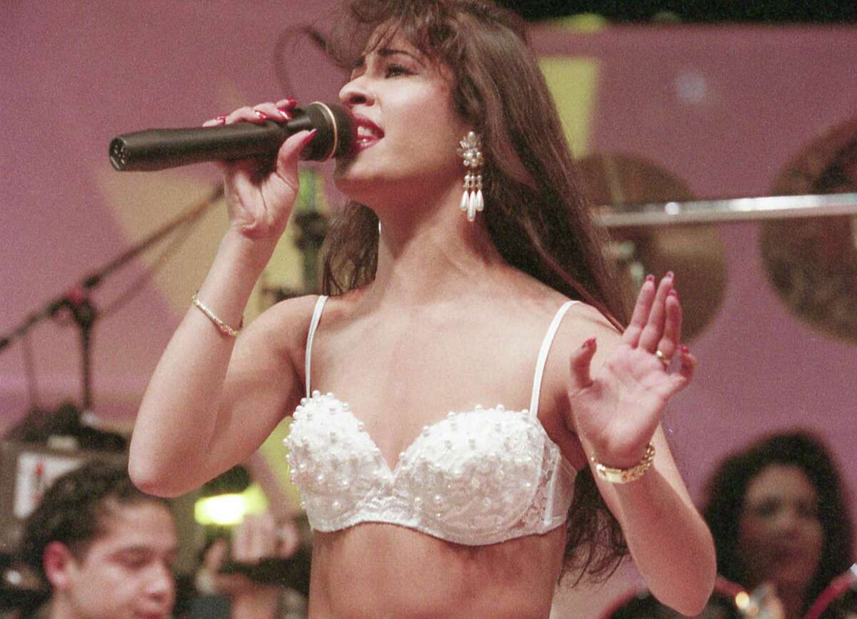 Selena, seen here performing at the Houston Livestock Show and Rodeo, also brought a daring fashion sense to Tejano muisc.