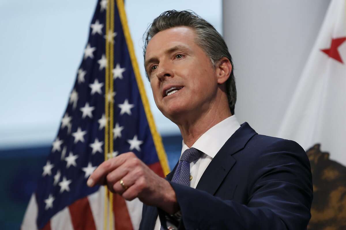 Gov. Gavin Newsom updates the state's response to the coronavirus at the Governor's Office of Emergency Services in Rancho Cordova, Calif., Monday, March 23, 2020. Newsom announced the closure of all state parking lots to discourage people from congregating at the state beaches and other public spaces during the coronavirus outbreak. (AP Photo/Rich Pedroncelli)