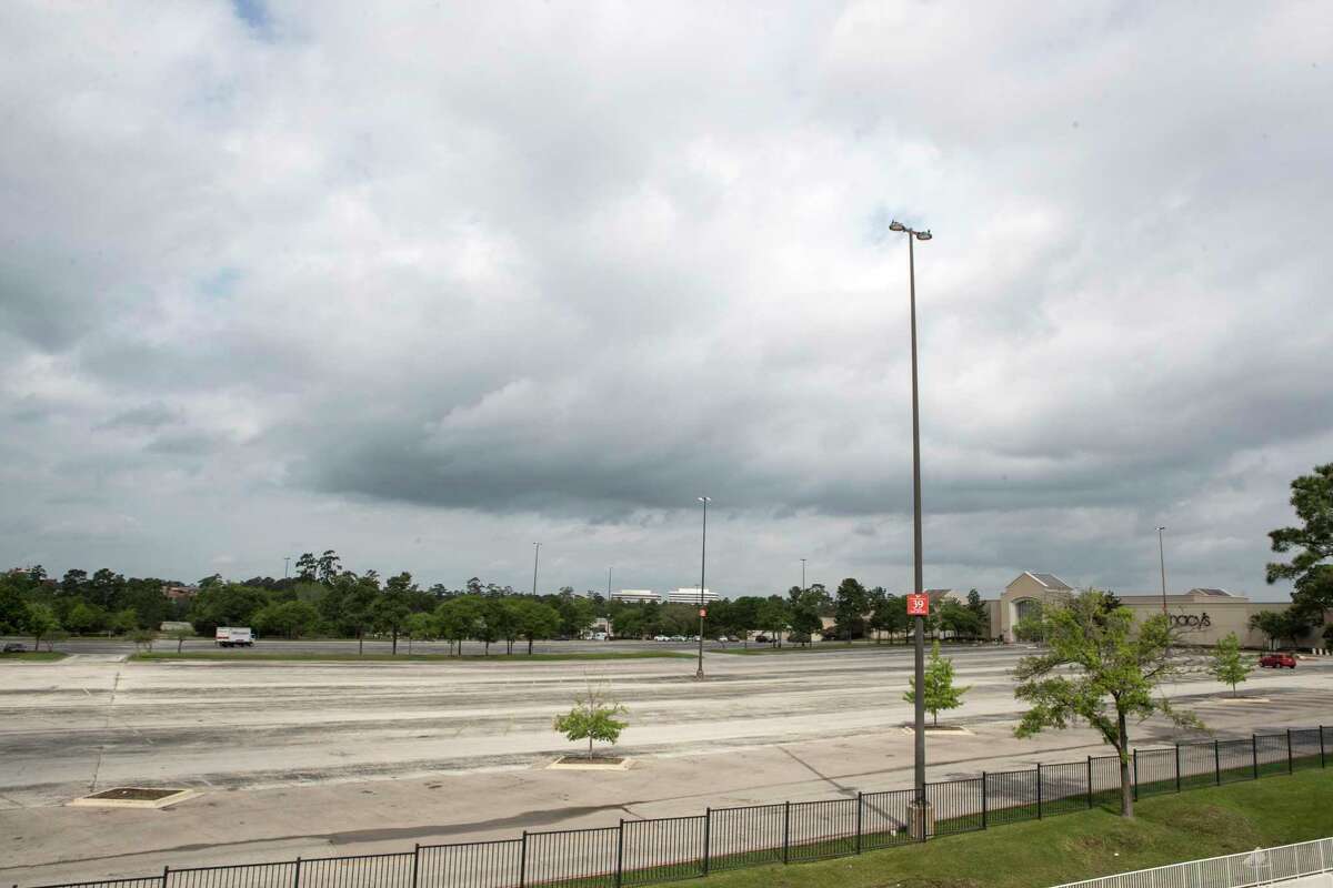 The parking lot at The Woodlands Mall stands empty on Thursday, March 19, 2020 in Houston. Many businesses across the Houston area have closed or cut hours in light of the coronavirus.