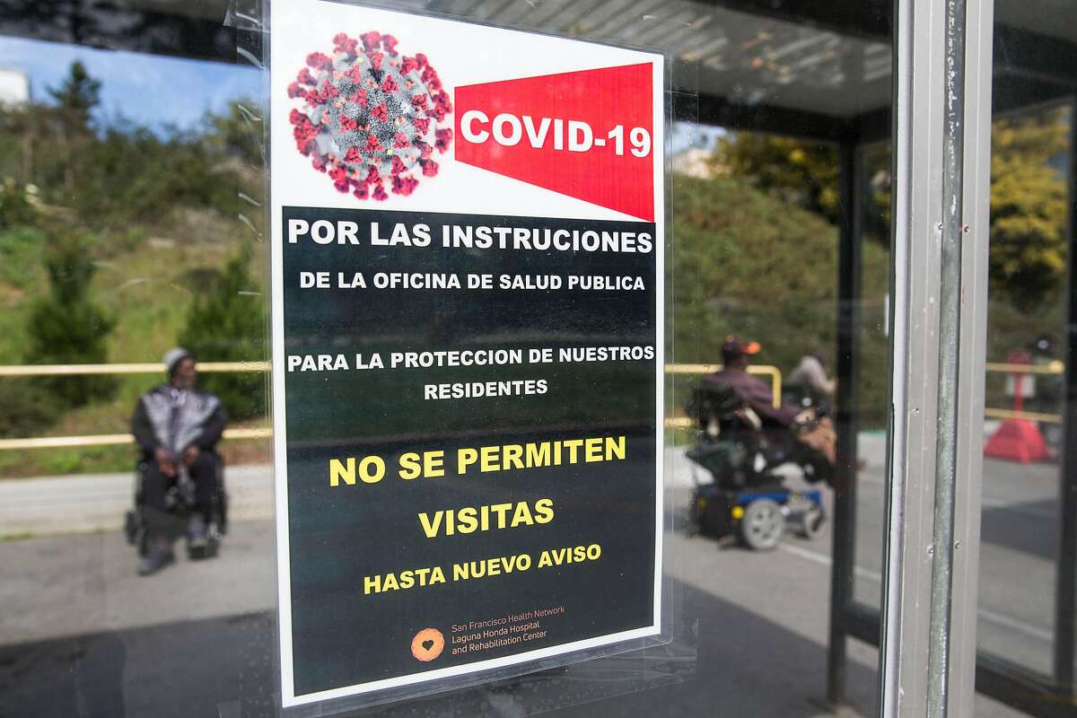 Signage outside the Laguna Honda Hospital entrance states that visitors are not allowed in.
