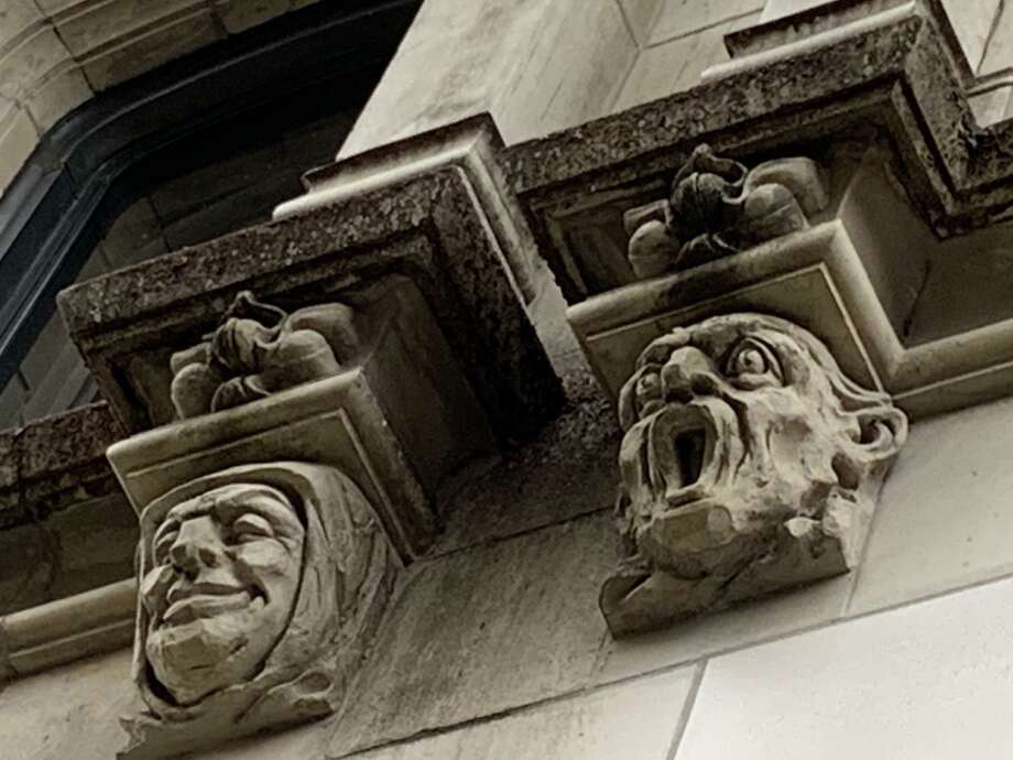 Rows of grotesque faces circle the lower exterior of the Tower Life Building, which opened in 1929 as the Smith-Young Tower. Photo: René Guzman