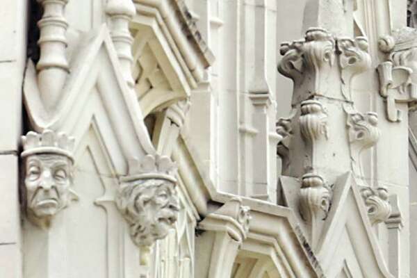 A closer look at the gargoylelike faces on the Emily Morgan Hotel.