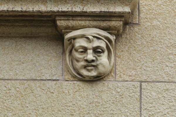 A closer look at one of the five gargoylelike faces on the former Nix Medical Center building.