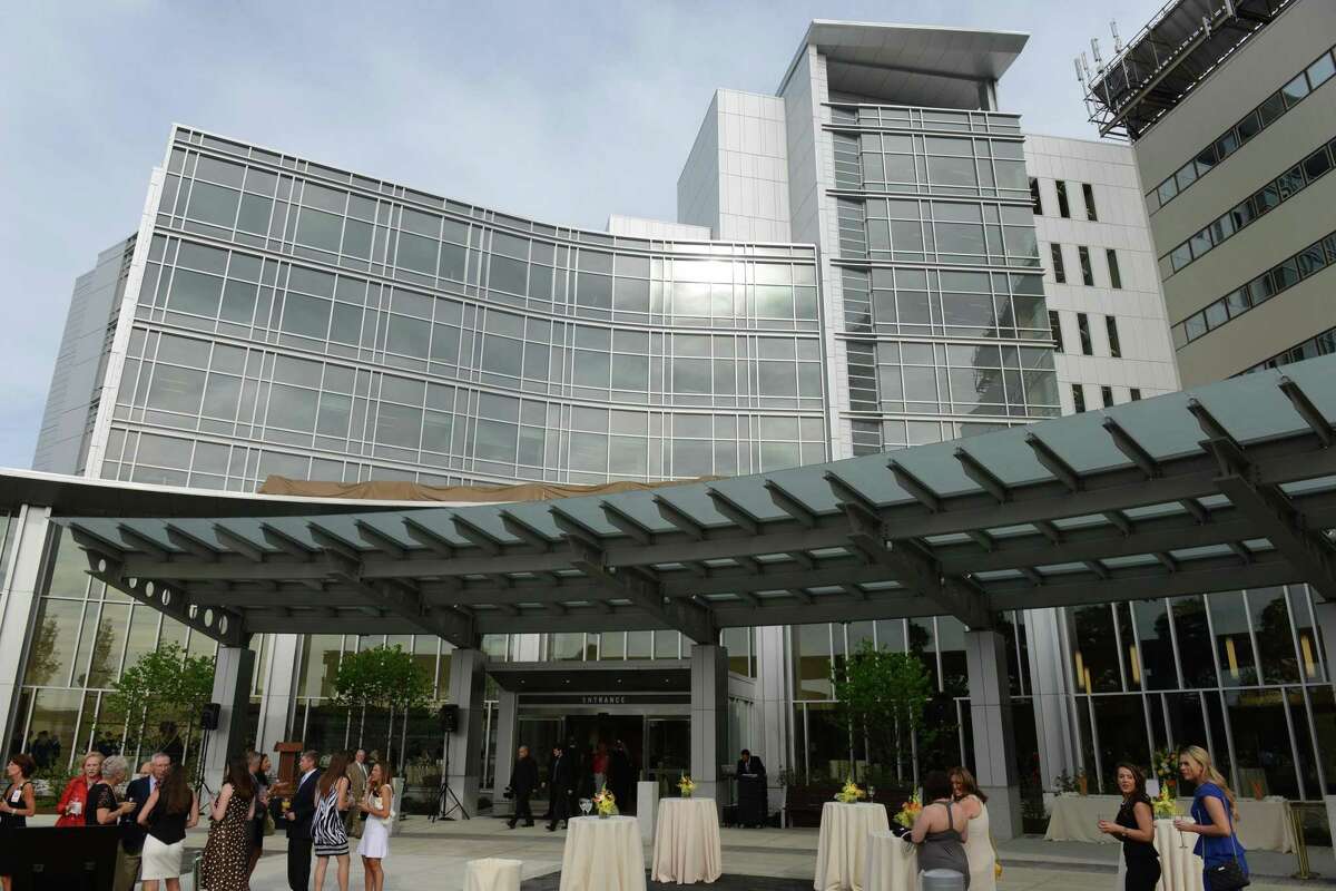 The state's first COVID-19 patient, who is being treated at Danbury Hospital, seems to be recovering, according to social media posts from his wife.