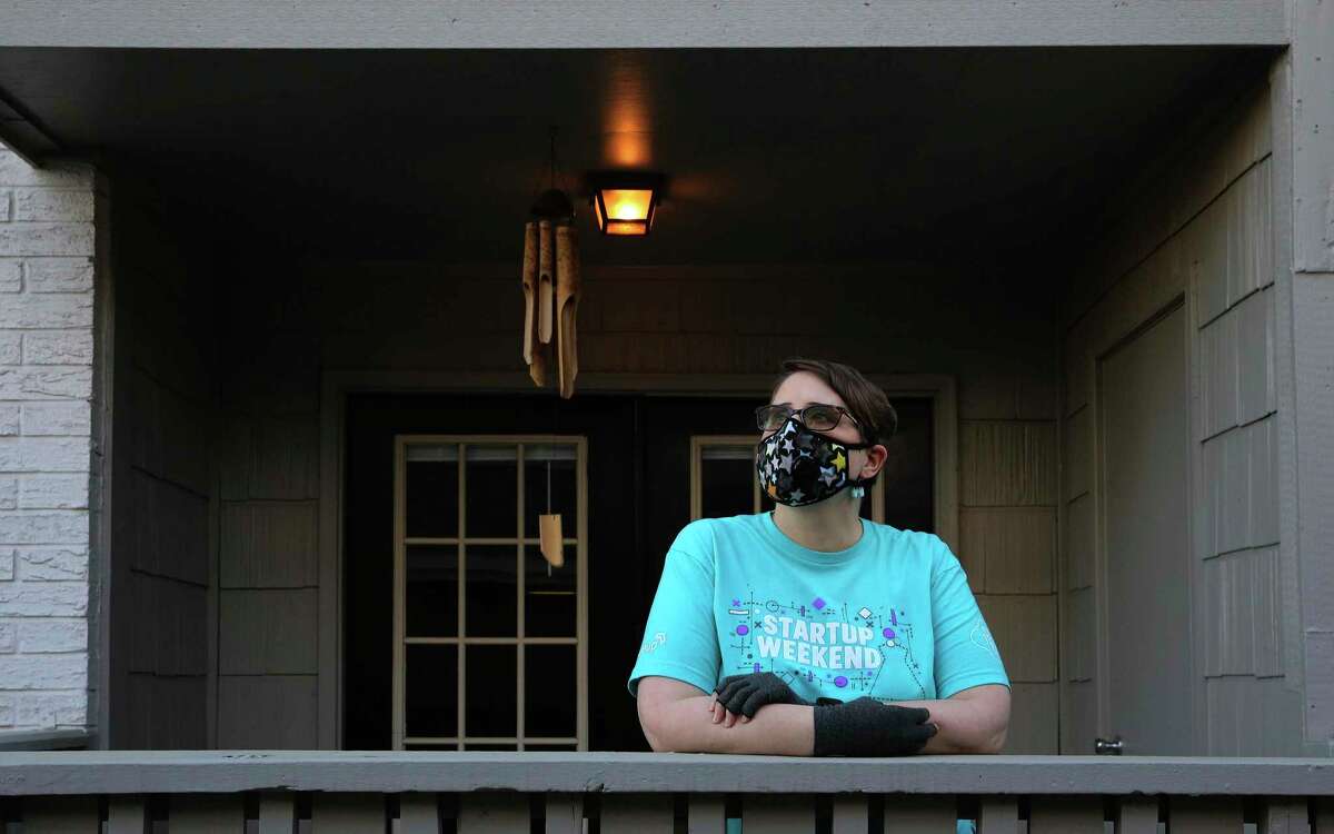 Jennifer Walker wears a mask outside her apartment in an effort to ward off any illnesses, including the novel coronavirus. A San Antonio resident with asthma, heart conditions, rheumatoid arthritis, fibromyalgia and other chronic illnesses, Walker helped create a social media campaign to raise awareness about the number of Americans at risk of contracting the coronavirus. In the 10 days of the campaign, thousands with similar medical conditions have shared their stories on Facebook, Instagram and Twitter.