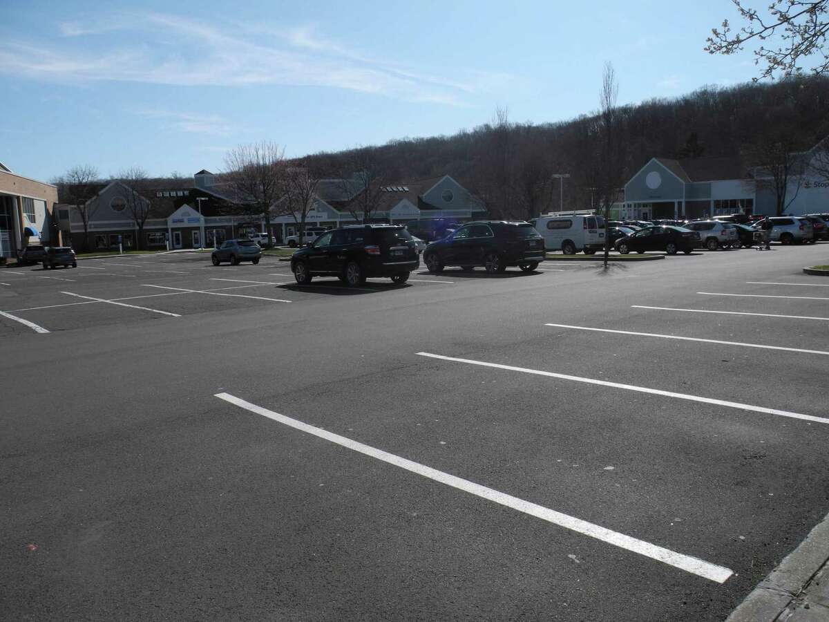 The River Park Plaza parking lot, where Stop & Shop is, has many fewer cars than normal on a Saturday afternoon.