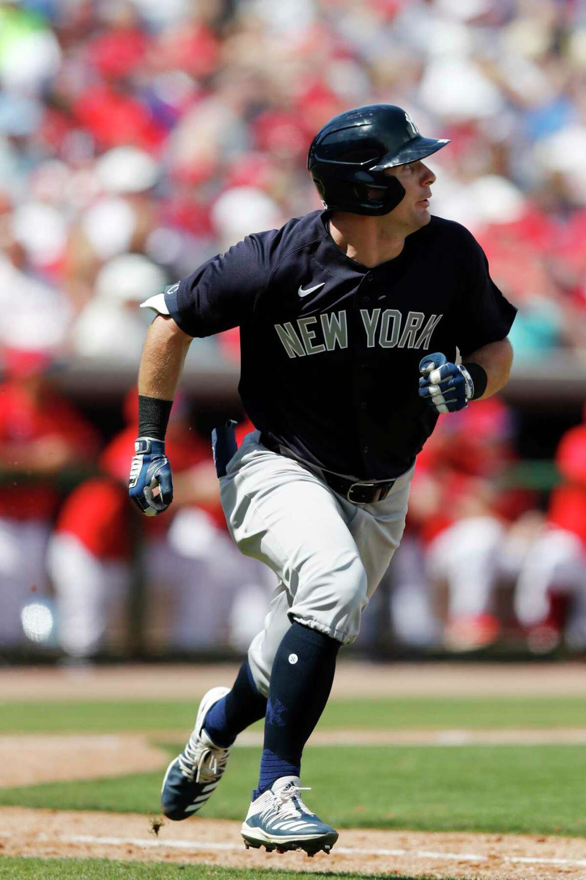 New York Yankees' Thomas Milone runs to first during a spring training baseball game, Monday, March 9, 2020, in Clearwater, Fla. (AP Photo/Carlos Osorio)