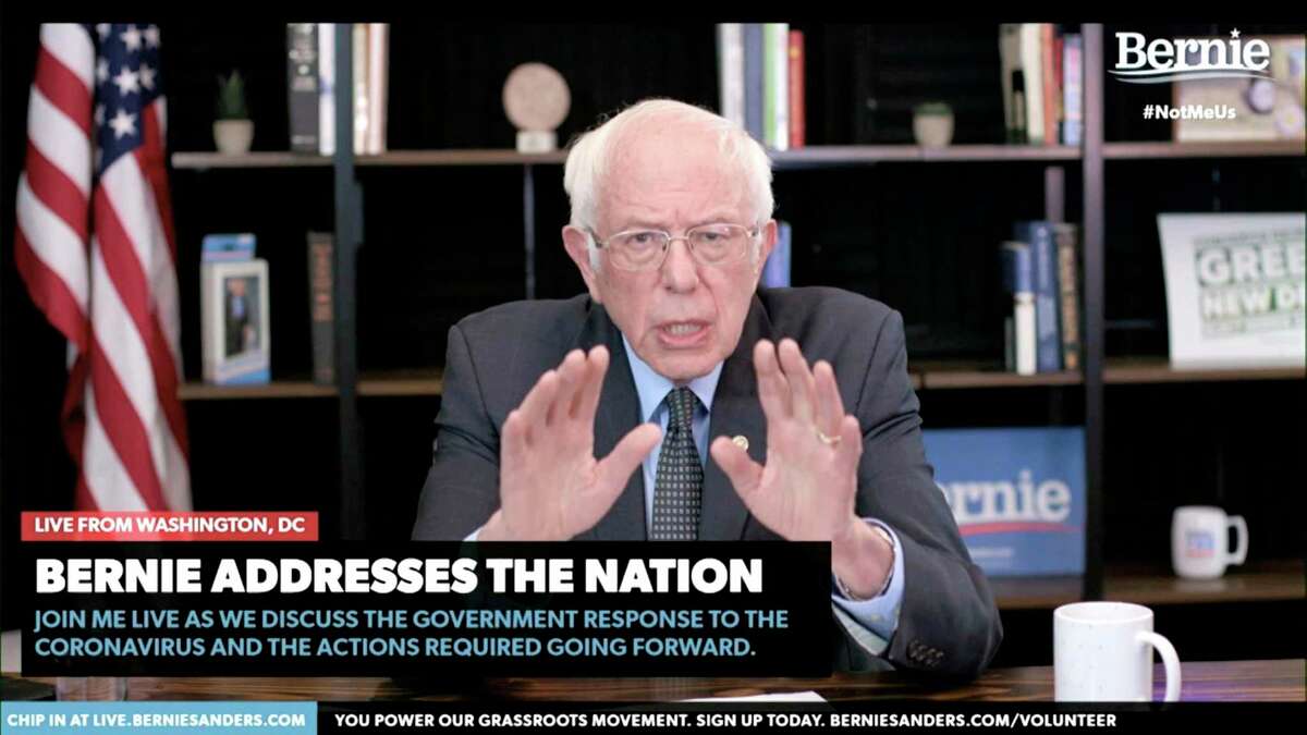 In this image from video provided by BernieSanders.com, Democratic presidential candidate Sen. Bernie Sanders, I-Vt., speaks from Washington, Tuesday, March 17, 2020. The coronavirus has disrupted American life, and the 2020 presidential campaign is no exception. Amid calls for social distancing to stop the pandemic’s spread, Democrats Joe Biden and Bernie Sanders, as well as Republican President Donald Trump, have had little choice but to call off large-scale public events in favor of politicking online and over the airwaves. (BernieSanders.com via AP)