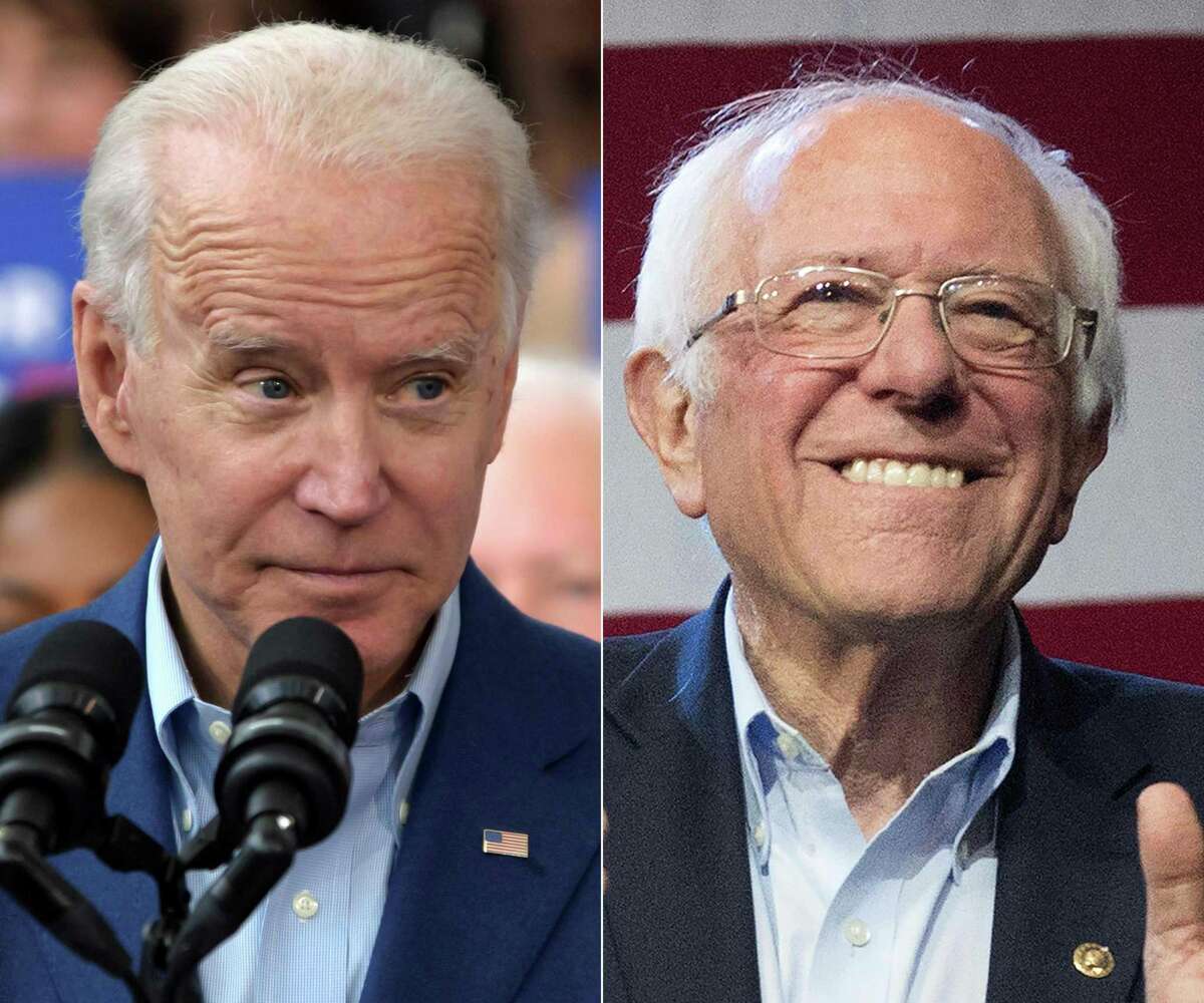 (FILES This combination of file pictures created on March 4, 2020 shows Democratic presidential candidate Joe Biden(L) speaking to supporters during a rally on March 2, 2020 at Texas Southern University in Houston, Texas, and Democratic White House hopeful Vermont Senator Bernie Sanders speaking during a campaign rally at the Convention Center in Los Angeles, California on March 1, 2020. - Joe Biden's trajectory to a November showdown with President Donald Trump looked unstoppable on March 11, 2020 after he scooped a series of devastating primary wins -- as the party waited anxiously to see if his rival Bernie Sanders would concede and rally behind the presumptive nominee. Pressure was mounting on Sanders to end his campaign as Biden inflicted defeats in Mississippi, Missouri, Idaho and Michigan, carving a clear path to becoming the Democratic standard bearer in a potentially bruising matchup with Trump. (Photos by Mark Felix and Mark RALSTON / AFP) (Photo by MARK FELIX,MARK RALSTON/AFP /AFP via Getty Images)
