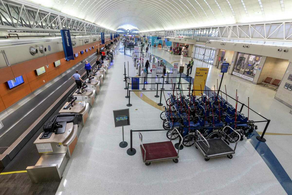 Terminal A at the San Antonio International Airport is virtually empty Wednesday, March 25, 2020 as air travel grinds to a halt due to the COVID-19 coronavirus.