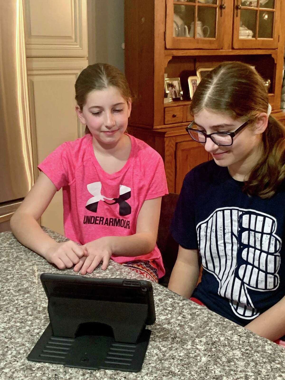 Co-presenters of the coronavirus youth webinar and Norwalk students Audra and Alexa Lacomis at their Norwalk, CT, home.