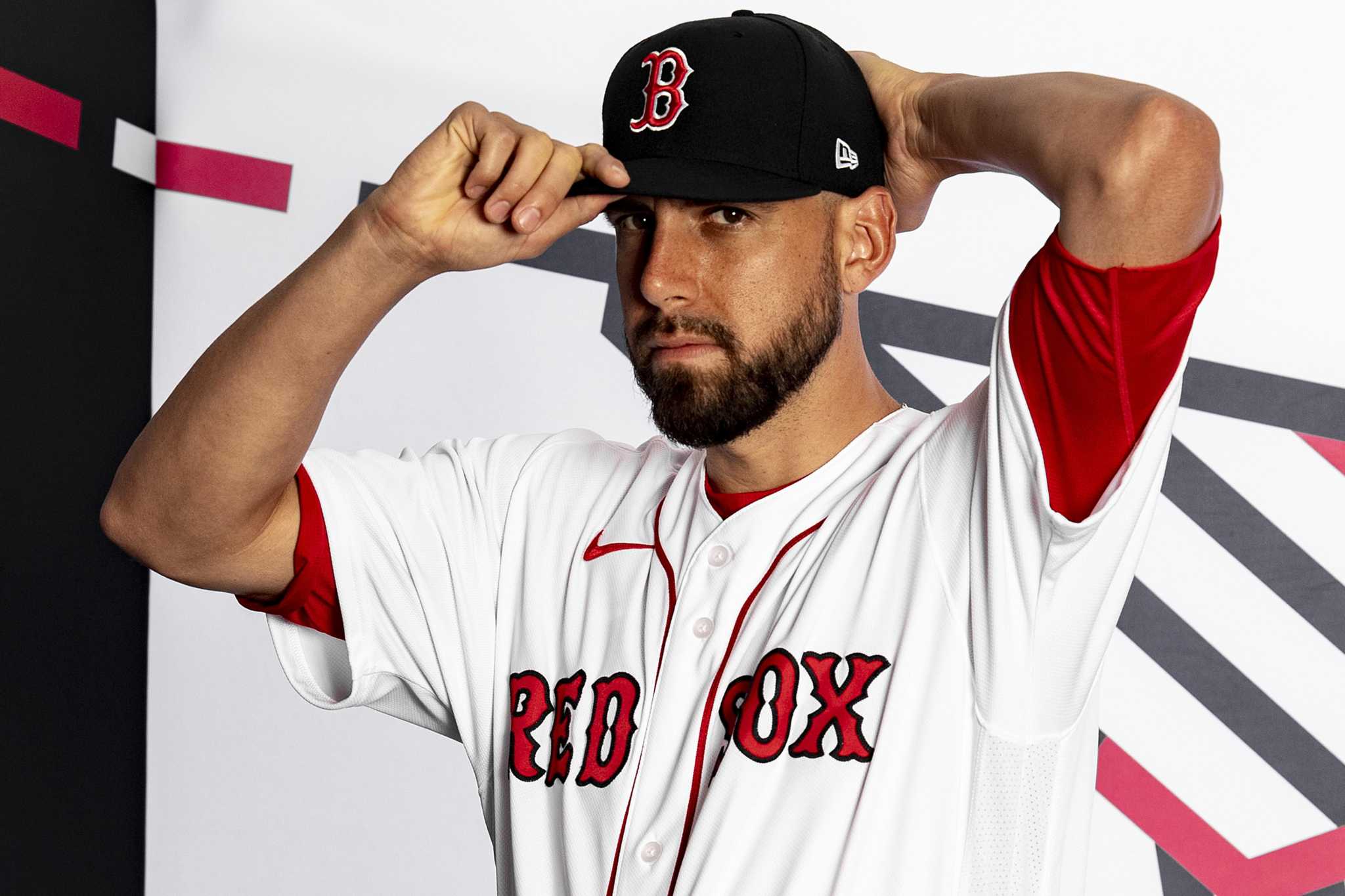 A vendor displays t-shirts on Jersey Street prior to the start of game two  of the MLB 2018 World Series between the Boston Red Sox and Los Angeles  Dodgers at Fenway Park